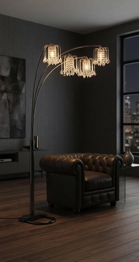 Crystal arch lamp dimmed above a dark dining table