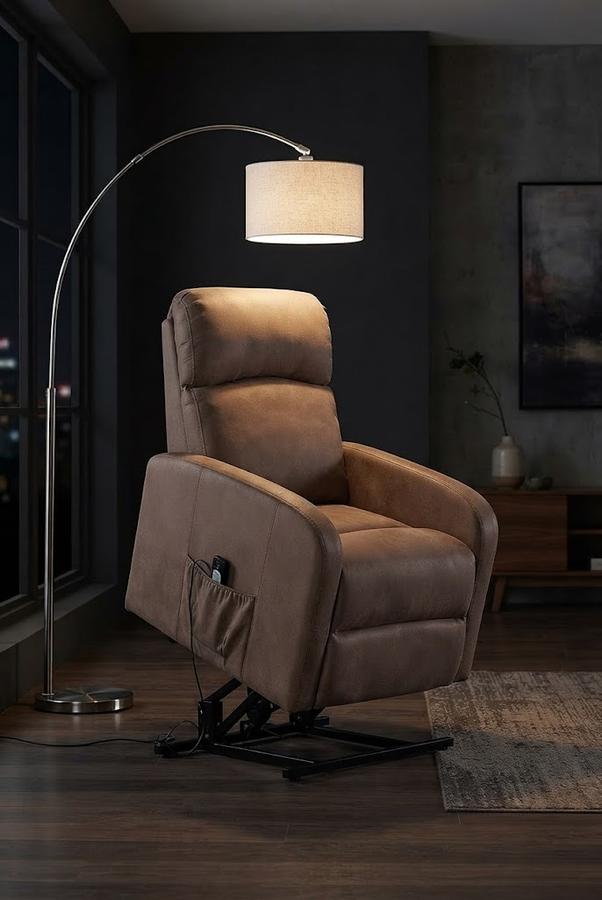 Taupe leather lift recliner under a reading lamp